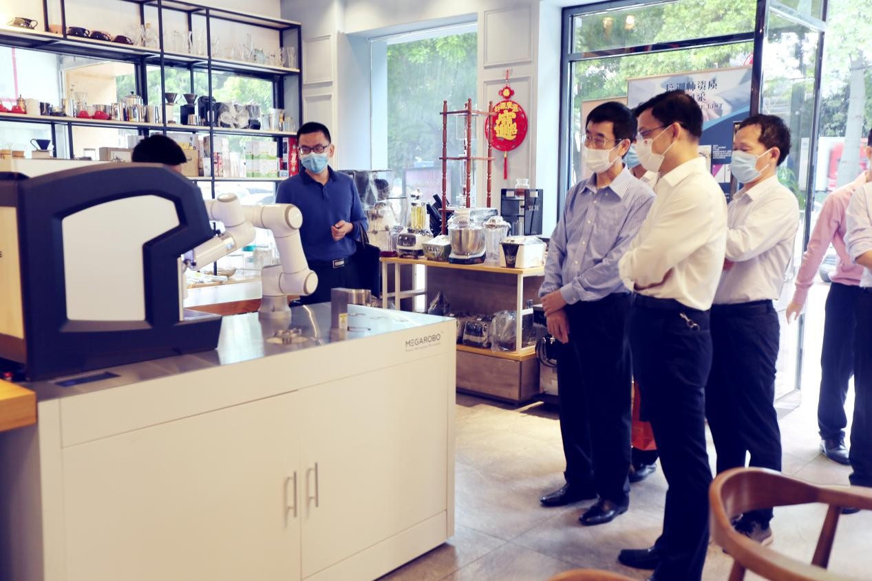广州市贸促会杨勇主任一行莅临金达咖啡饮品城调研指导工作